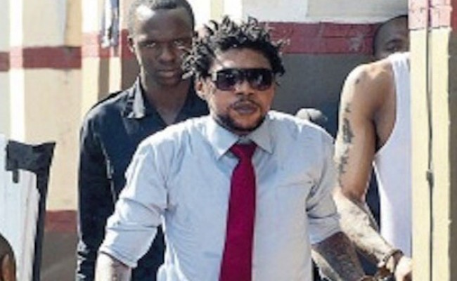 Vybz Kartel murder trial damning incriminating audio evidene tattoo on hand court Clive Lizard Jamaica