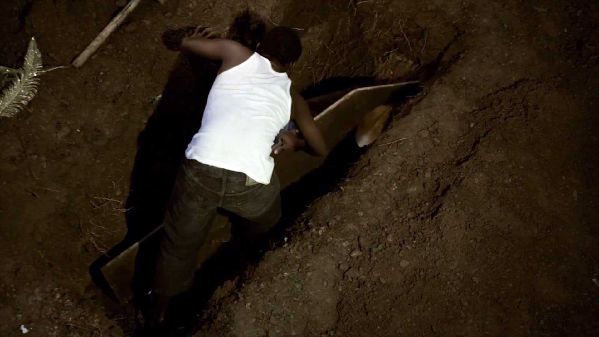 people robbing graves