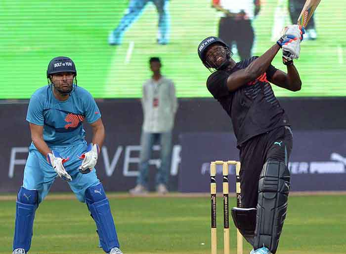Watch Usain Bolt play cricket hitting six bowling batting
