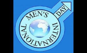 "International Men's Day Symbol" by Jason Thompson (IMD Historian and IMD-Nonprofit Associate). - International Men's Day symbol created by IMD-Nonprofit - promotors of IMD. Licensed under Public Domain via Commons.