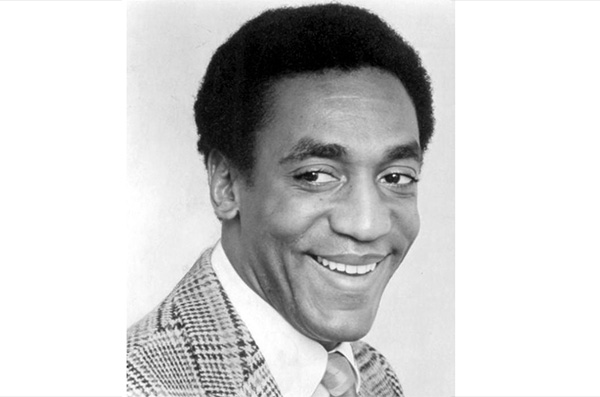 "Bill cosby 1969" by William Morris AgencyUploaded by We hope at en.wikipedia - eBay itemphoto frontphoto back. Licensed under Public Domain via Commons.