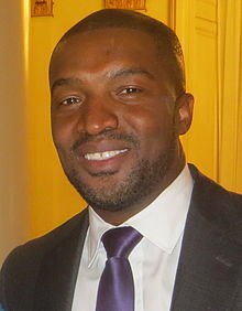 "Roger Cross 2014" by sean.koo - IMG_1094. Licensed under CC BY-SA 2.0 via Commons.