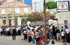 Job seekers line up at the Ministry of Labour and Social Security on East Street in Kingston in search of overseas employment yesterday.