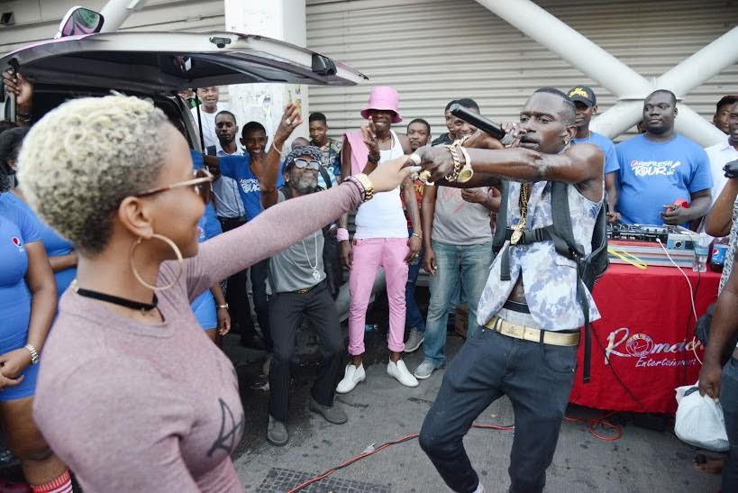 Tanto Blacks serenades Lia Caribe as he performs a brand new song for spectators at the Pepsi Refresh Tour held last Friday outside the Half-Way-Tree Transport Centre. The five week, islandwide campaign will feature pop music events, trade activations and culminate in a massive concert, dubbed ‘Pepsi Refresh Live’ on August 13 at Pepsi 214 at 214 Spanish Town Road.