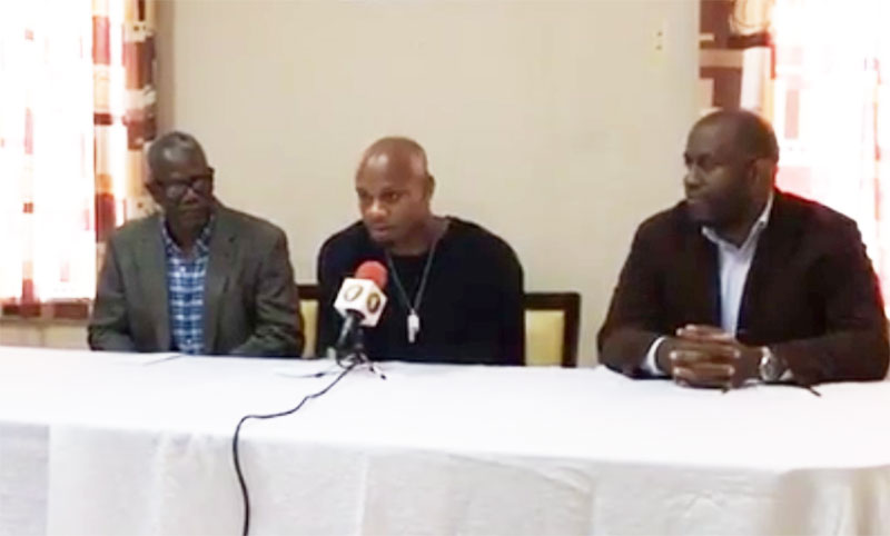 Asafa Powell (centre) via Facebook during Handover at KPH (October 28)