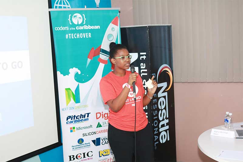Student pitch her mobile app ideas at Coders Of The Caribbean